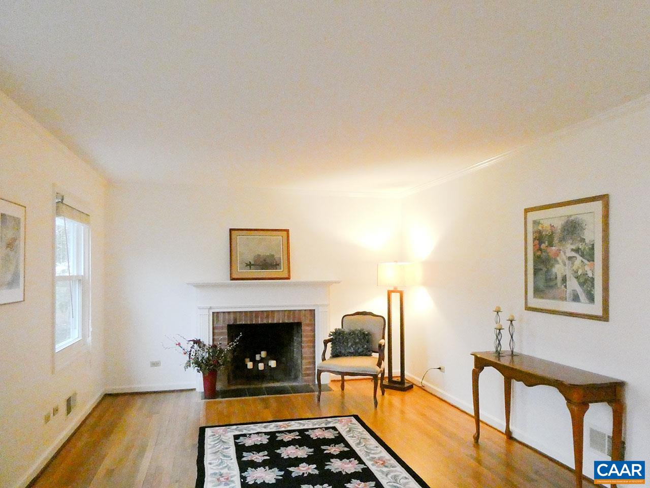 1606 Dublin Road Charlottesville, VA 22903 - Photo 3 of 34 a living room with furniture a fireplace and window