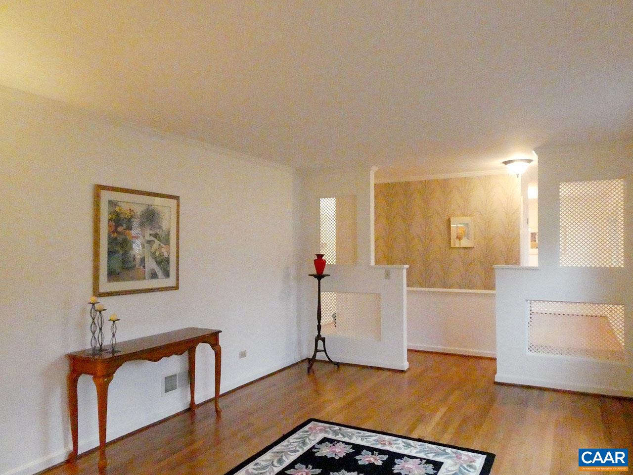 1606 Dublin Road Charlottesville, VA 22903 - Photo 5 of 34 a view of a livingroom with furniture and wooden floor