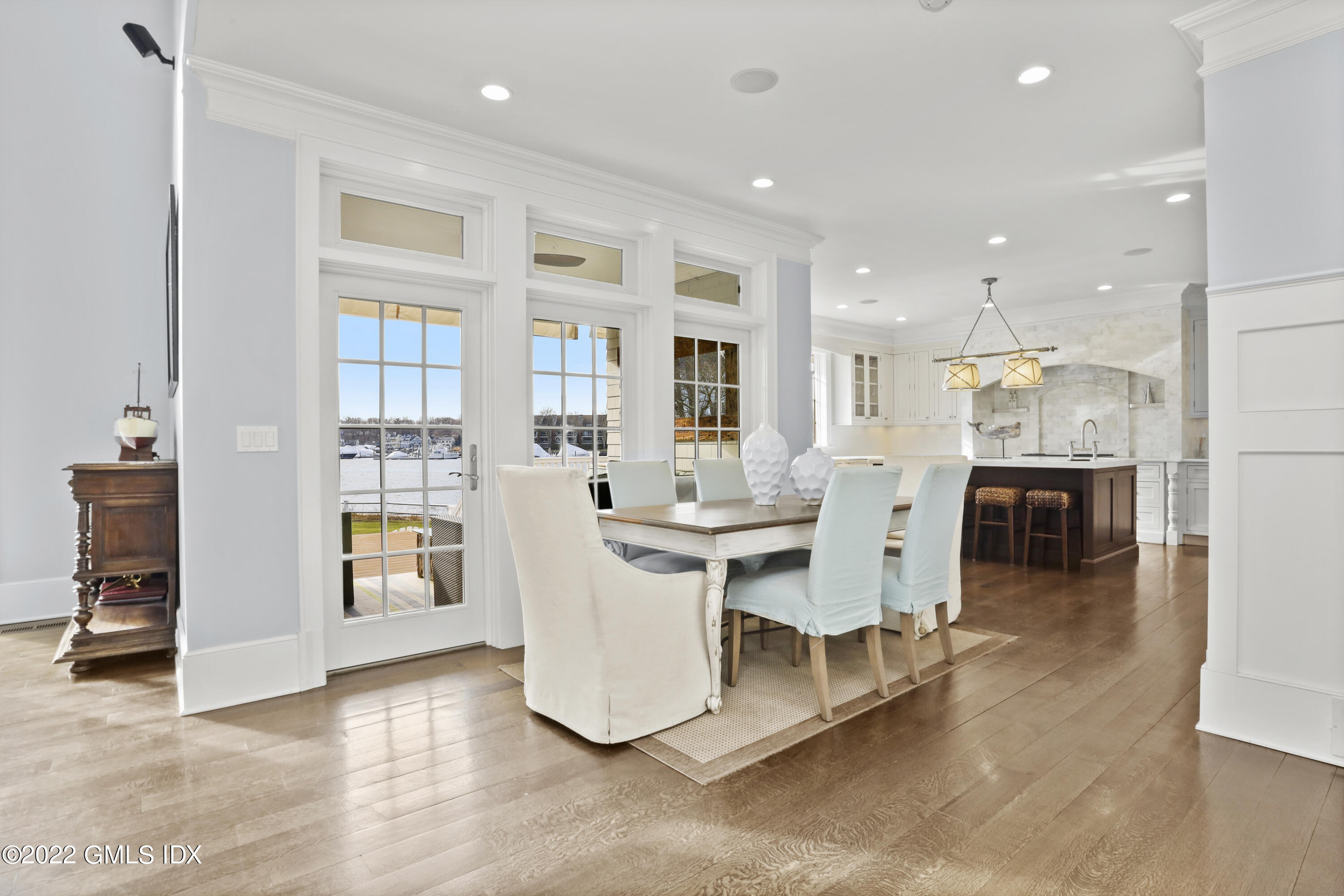 30 Bayside Terrace Riverside, CT 06878 - Photo 18 of 50 a dining room with furniture and a kitchen view