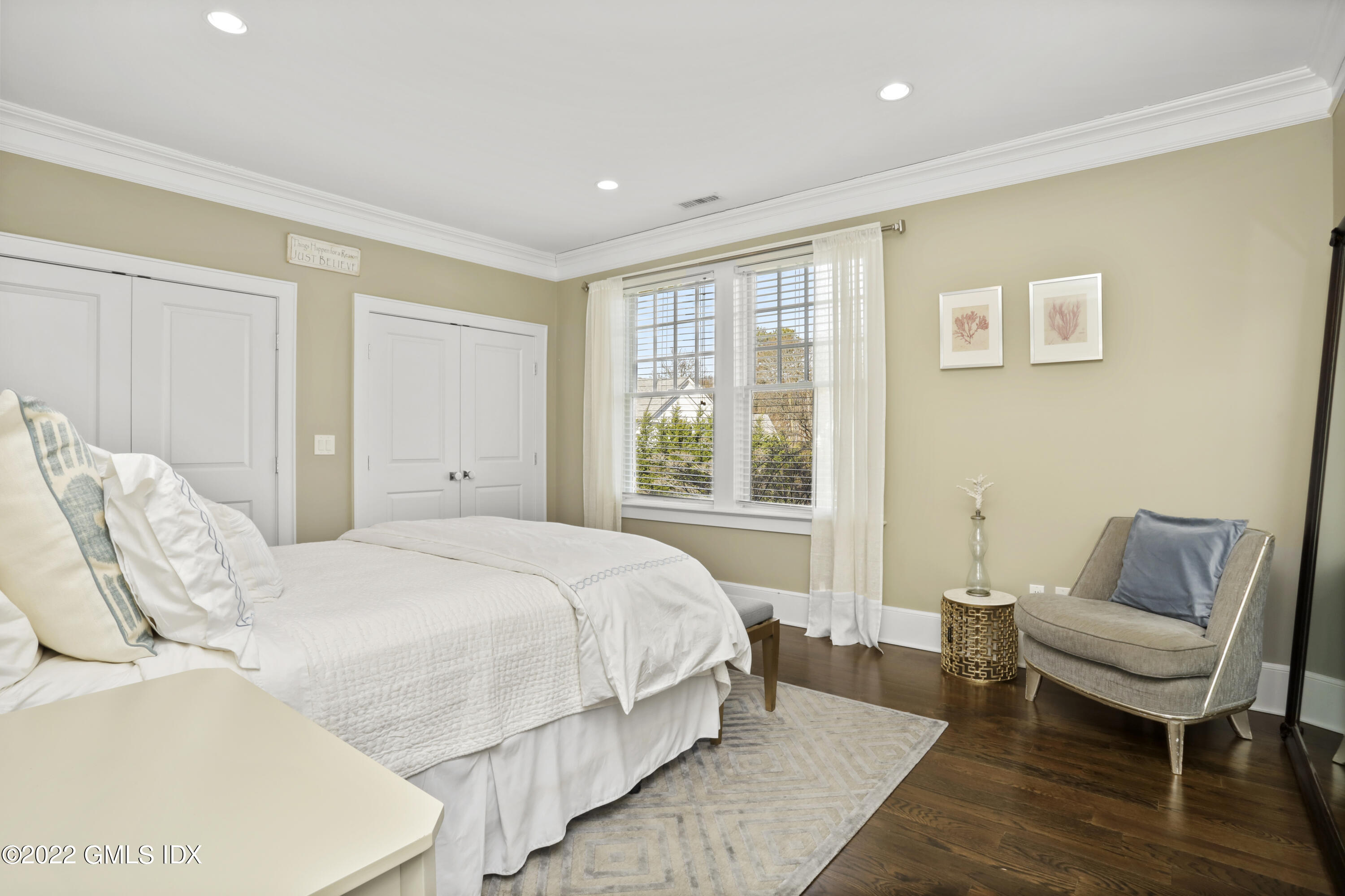 30 Bayside Terrace Riverside, CT 06878 - Photo 34 of 50 a spacious bedroom with a bed and a couch