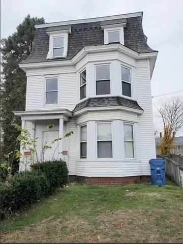 a house view with a garden space