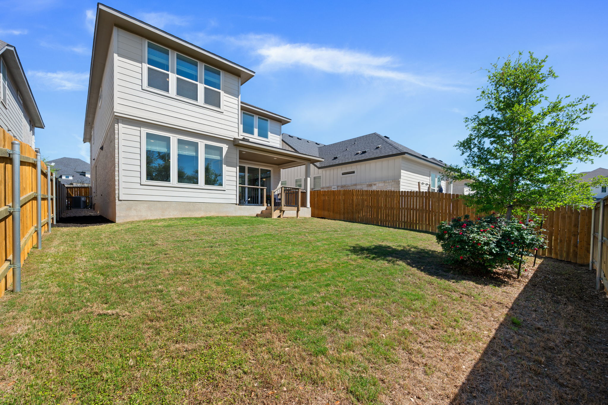 256 Comfort Maple Lane Dripping Springs, TX 78620 - Photo 29 of 39 The home offers generous backyard space.