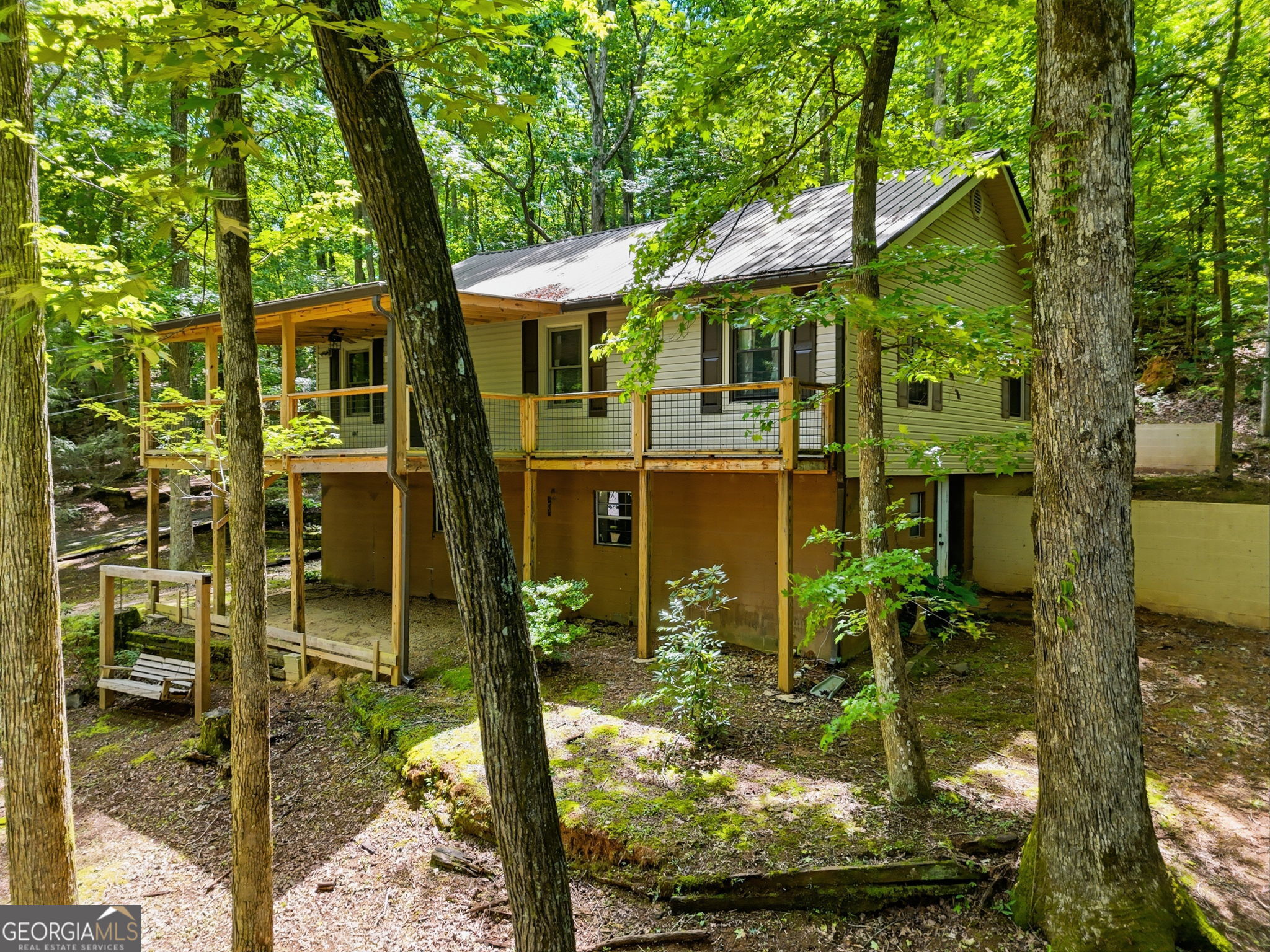 629 Goose Island Road Cherry Log, GA 30522 - Photo 46 of 52 a view of a house with backyard porch and sitting area