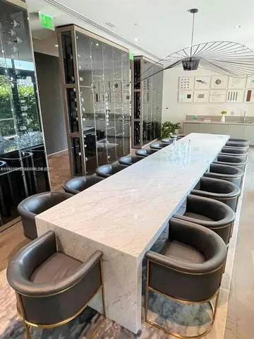 a view of outdoor space with fountain and sitting area