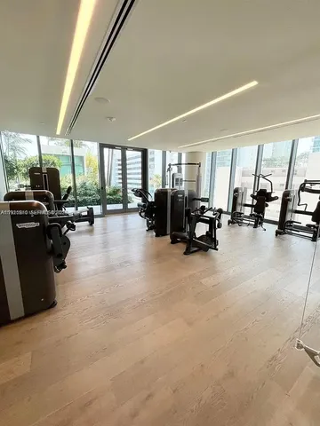 a view of a patio with couches and potted plants
