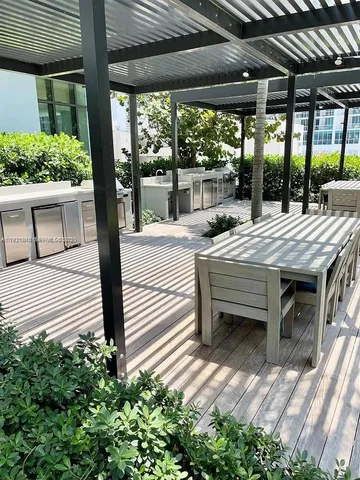 a view of a yard with an outdoor space