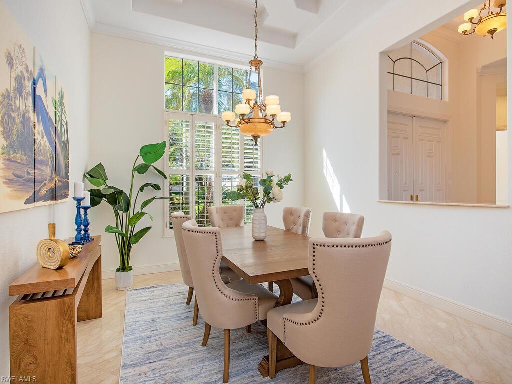 427 Terracina Way Naples, FL 34119 - Photo 11 of 17 More formal dining room