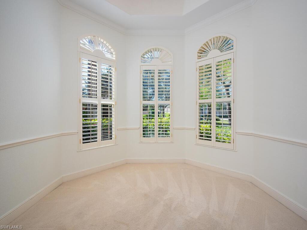 427 Terracina Way Naples, FL 34119 - Photo 12 of 17 Has a closest and is next to the power room