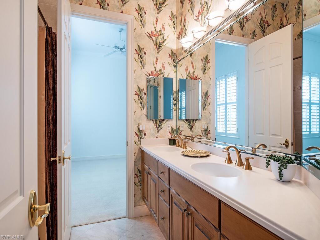 427 Terracina Way Naples, FL 34119 - Photo 16 of 17 One of the two full guest baths