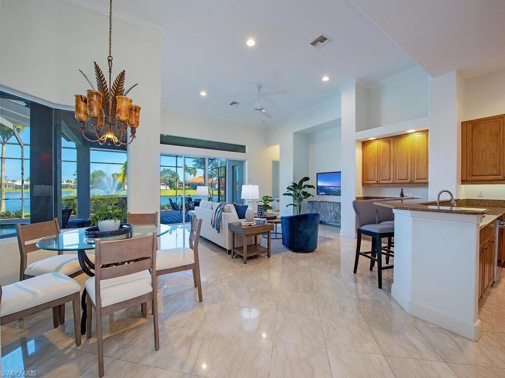 427 Terracina Way Naples, FL 34119 - Photo 6 of 17 Kitchen, family and informal dining