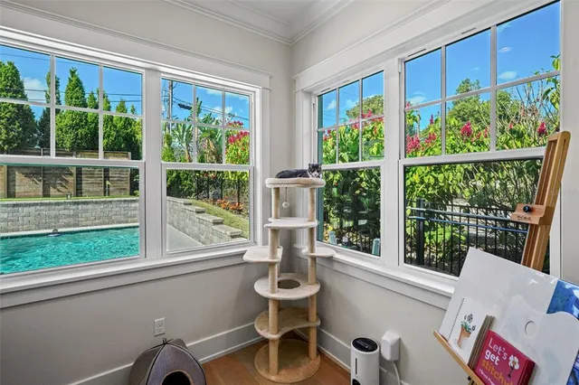 a view of a dining room with furniture window and outside view