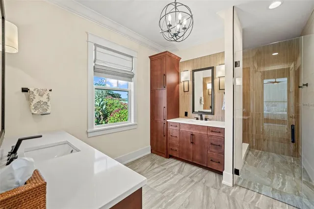 a large spacious bathroom with a large tub and shower