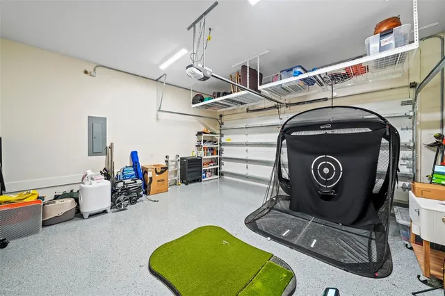 a living room with furniture and flowers