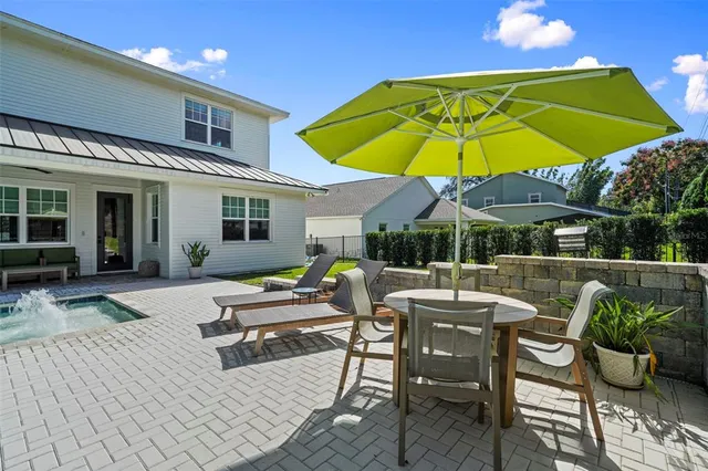 a view of a backyard with plants