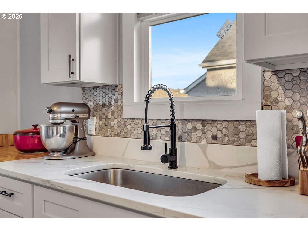 519 West Main Street Sheridan, OR 97378 - Photo 18 of 41 a kitchen with a sink and cabinets