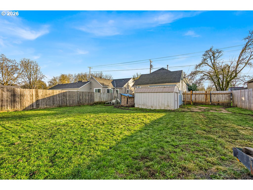 519 West Main Street Sheridan, OR 97378 - Photo 27 of 41 a view of a barn in the middle of a yard