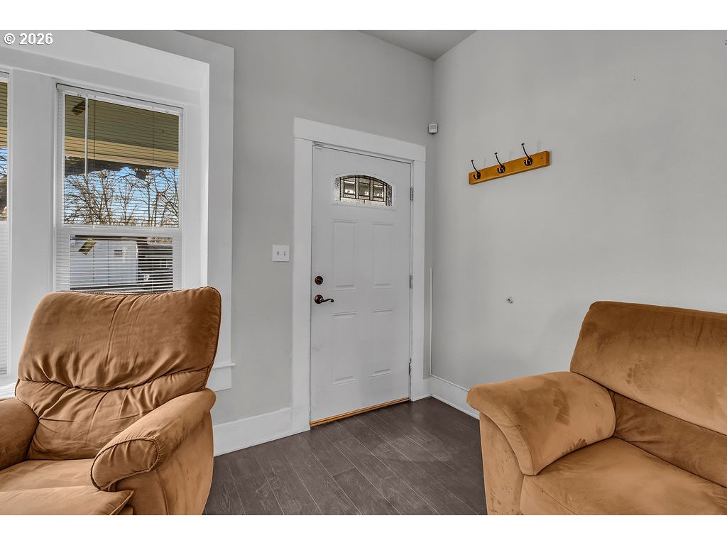 519 West Main Street Sheridan, OR 97378 - Photo 8 of 41 a living room with furniture and a window