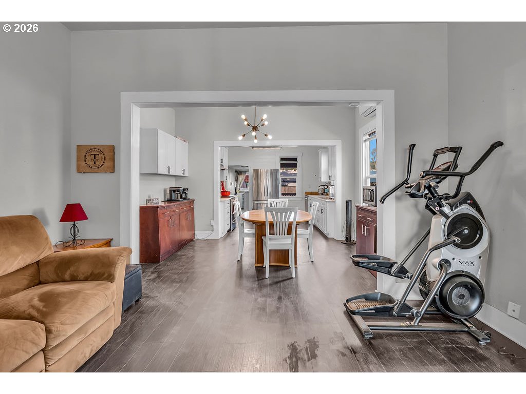 519 West Main Street Sheridan, OR 97378 - Photo 10 of 41 a view of a livingroom with furniture and gym equipment