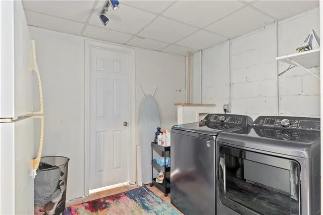 a utility room with dryer and washer