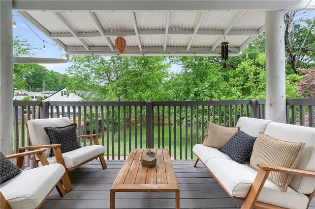 a view of a patio with wooden floor