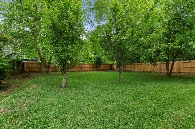 a view of outdoor space with deck and green space