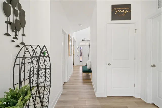 a view of entryway with wooden floor