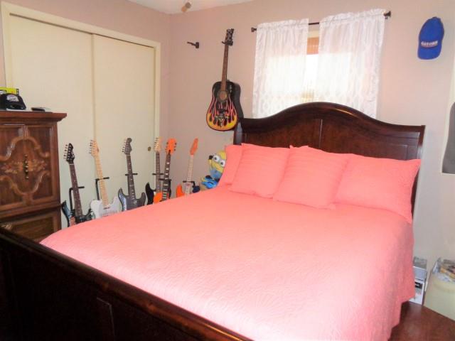 2069 Fall River Road Leoma, TN 38468 - Photo 14 of 26 a bedroom with a bed and a dresser
