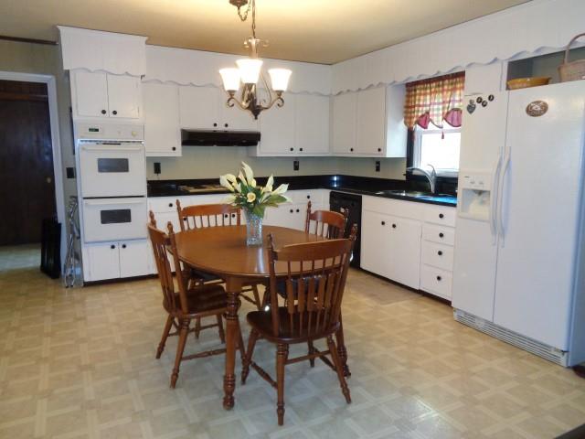 2069 Fall River Road Leoma, TN 38468 - Photo 6 of 26 a view of a dining room with furniture