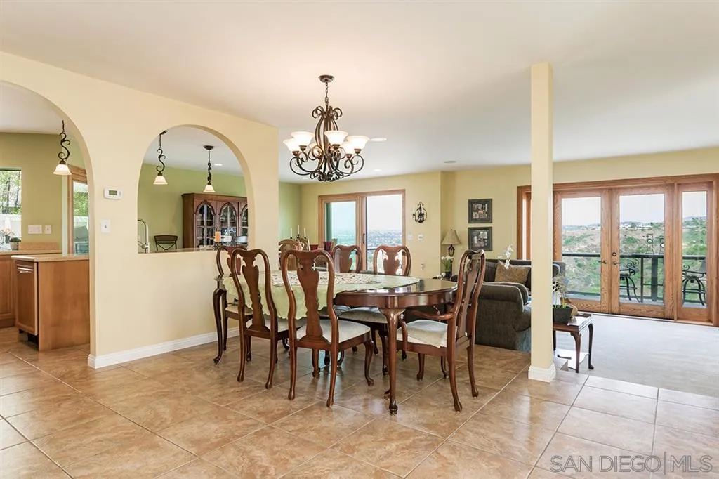 1717 Gascony Road Encinitas, CA 92024 - Photo 8 of 25 a view of a dining room with furniture window and outside view