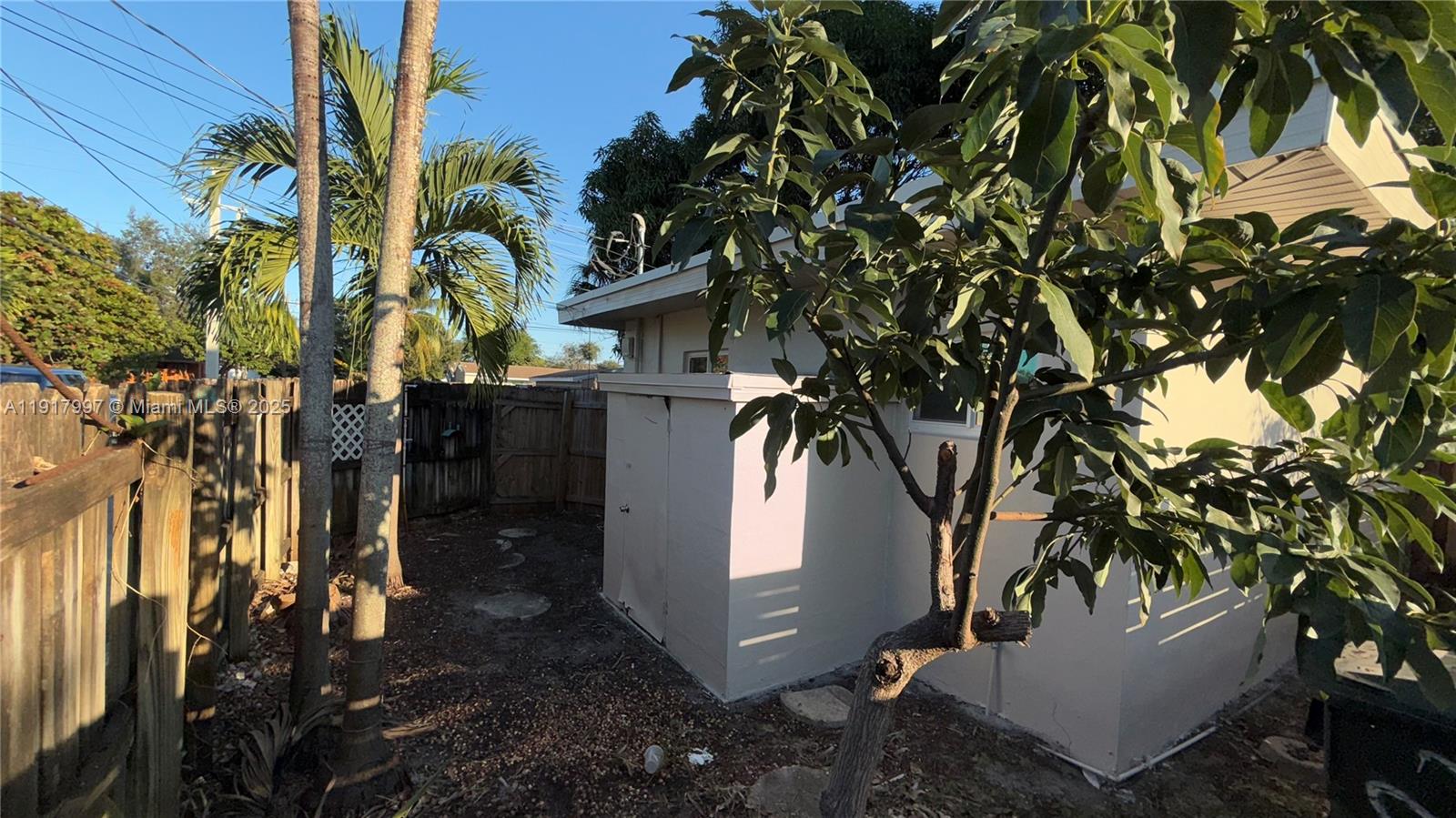 212 Southwest 13th Street, Unit 3 Dania Beach, FL 33004 - Photo 10 of 11 a view of a backyard