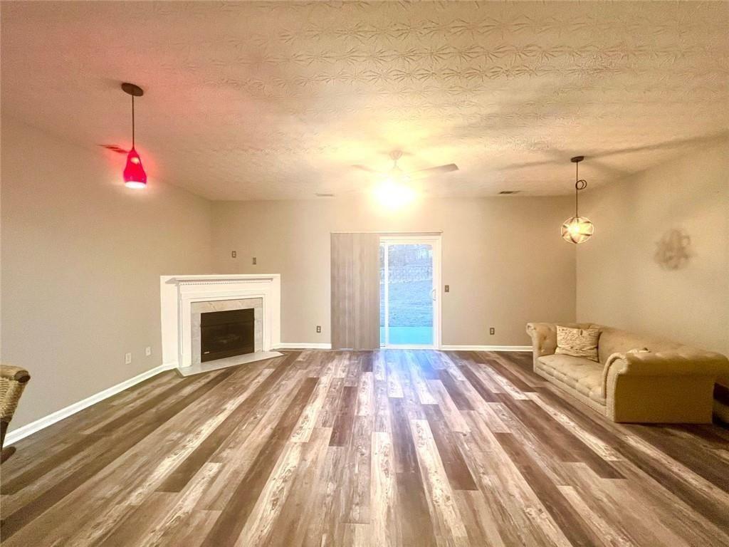 3854 Austin Park Lane Decatur, GA 30032 - Photo 12 of 44 a view of empty room with wooden floor and fan
