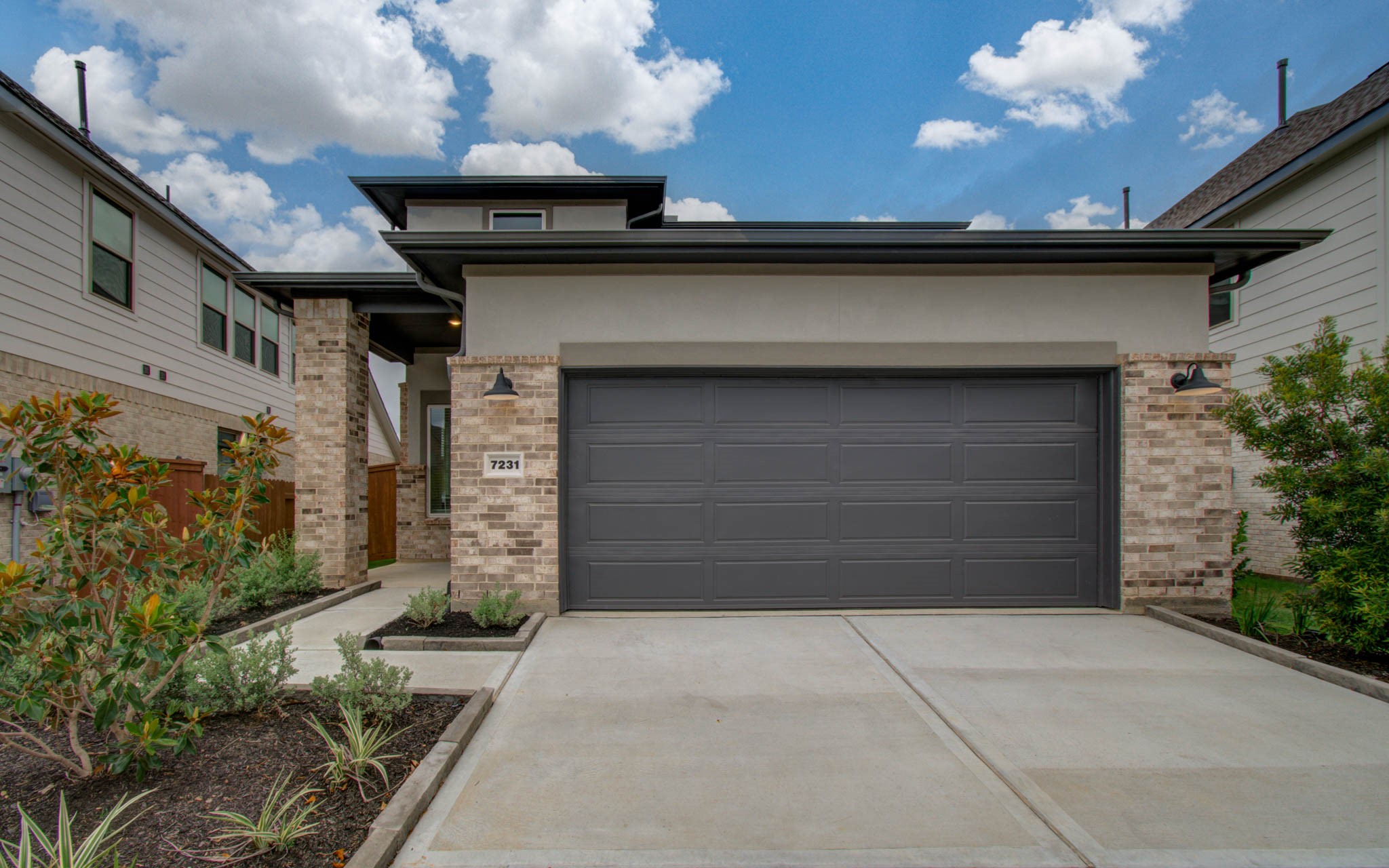 7231 Yarrow Blossom Court Katy, TX 77493 - Photo 7 of 49 a view of entryway with a flower garden
