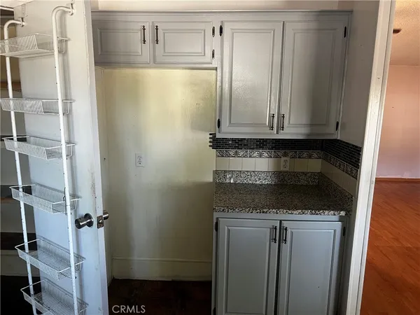 a room with furniture and a fireplace