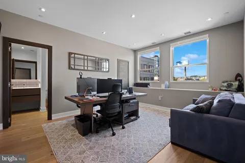 a workspace with furniture and window