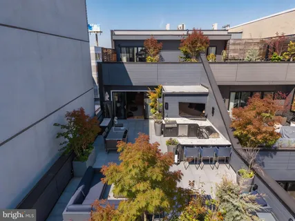 an aerial view of a house with swimming pool