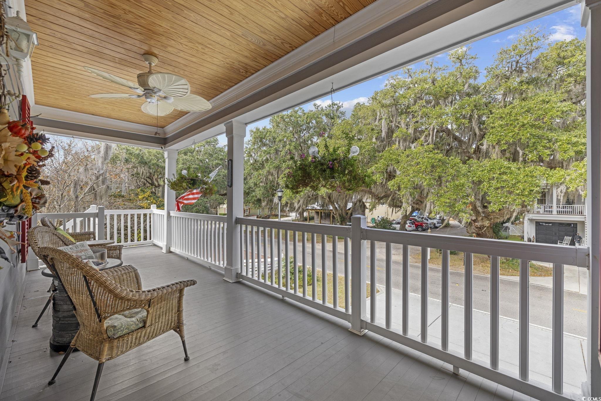 4398 Murrells Inlet Road Murrells Inlet, SC 29576 - Photo 9 of 38 Wooden terrace with a ceiling fan