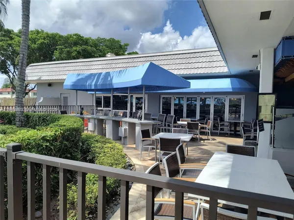 an aerial view of residential houses and outdoor space