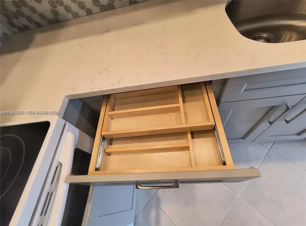 a view of livingroom with furniture and a flat screen tv