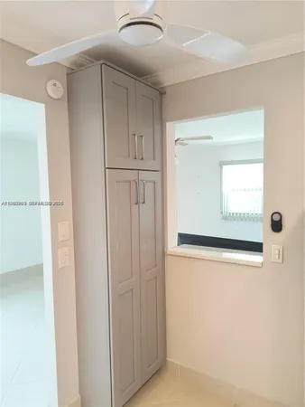 a view of a kitchen with a sink