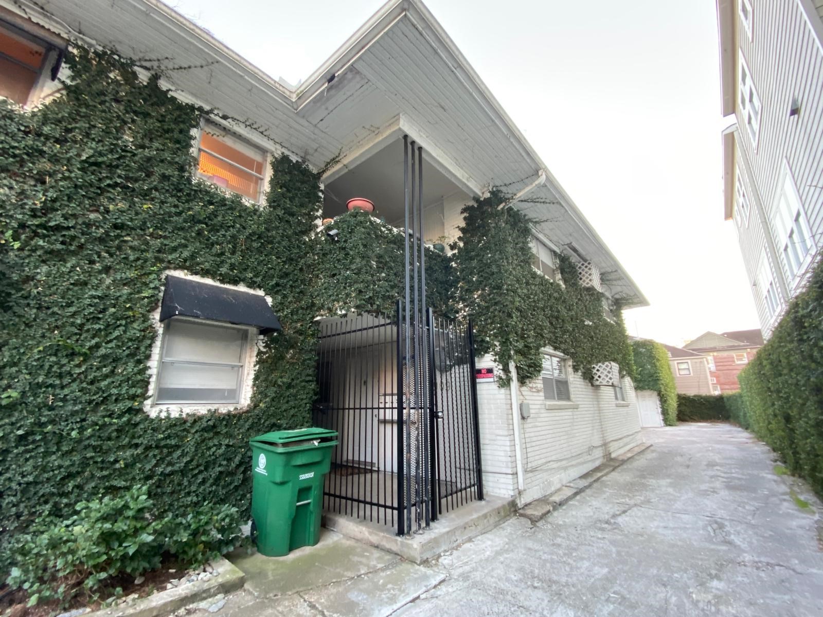 1909 Colquitt Street, Unit 3 Houston, TX 77098 - Photo 16 of 16 a backyard of a house with plants and outdoor seating