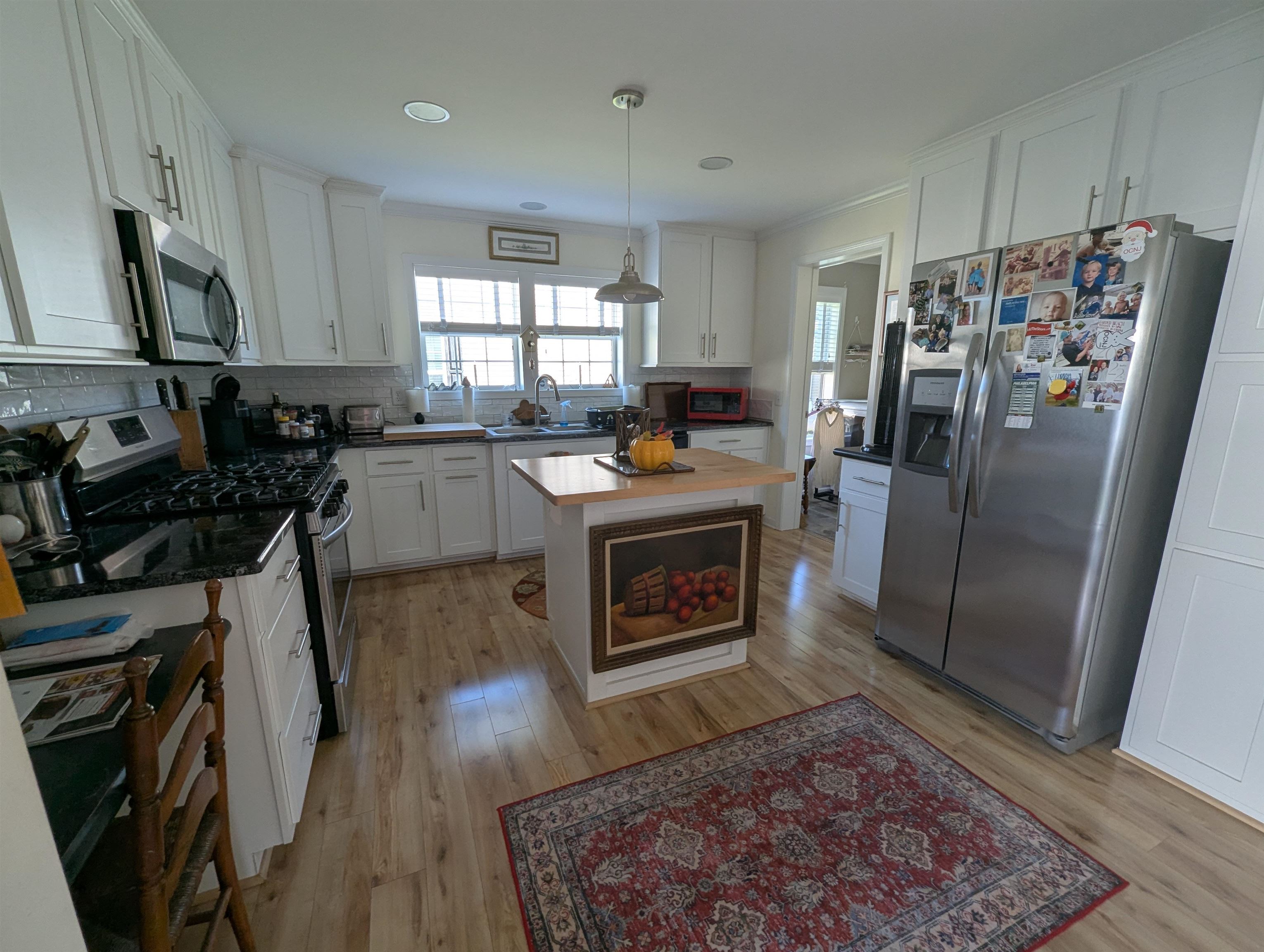 2058 Shore Ocean View, NJ 08230 - Photo 6 of 28 a kitchen with stainless steel appliances granite countertop a refrigerator stove top oven and sink