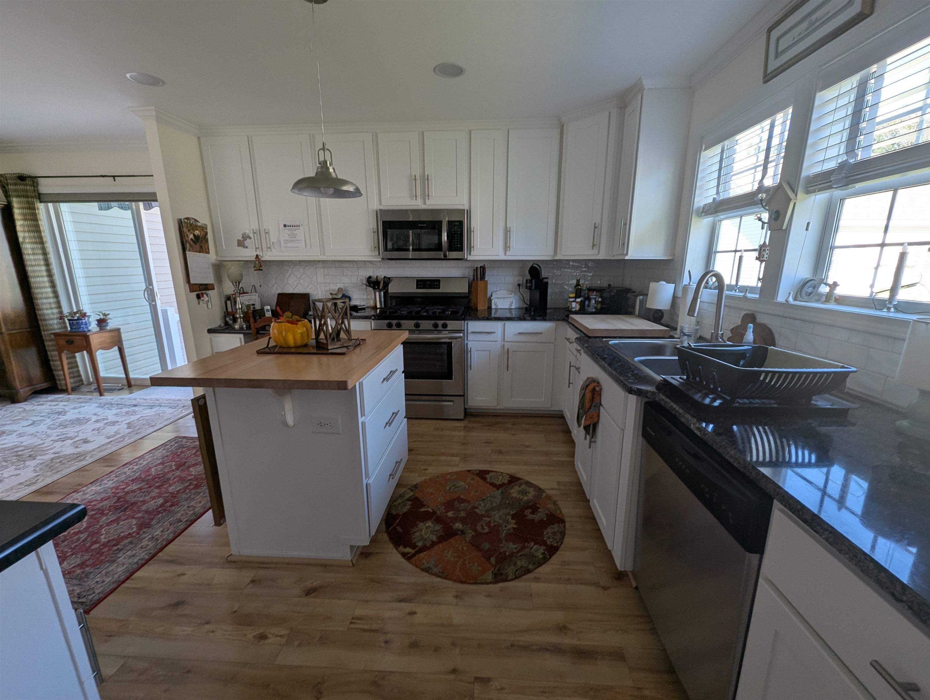 2058 Shore Ocean View, NJ 08230 - Photo 8 of 28 a kitchen with a sink stove and cabinets