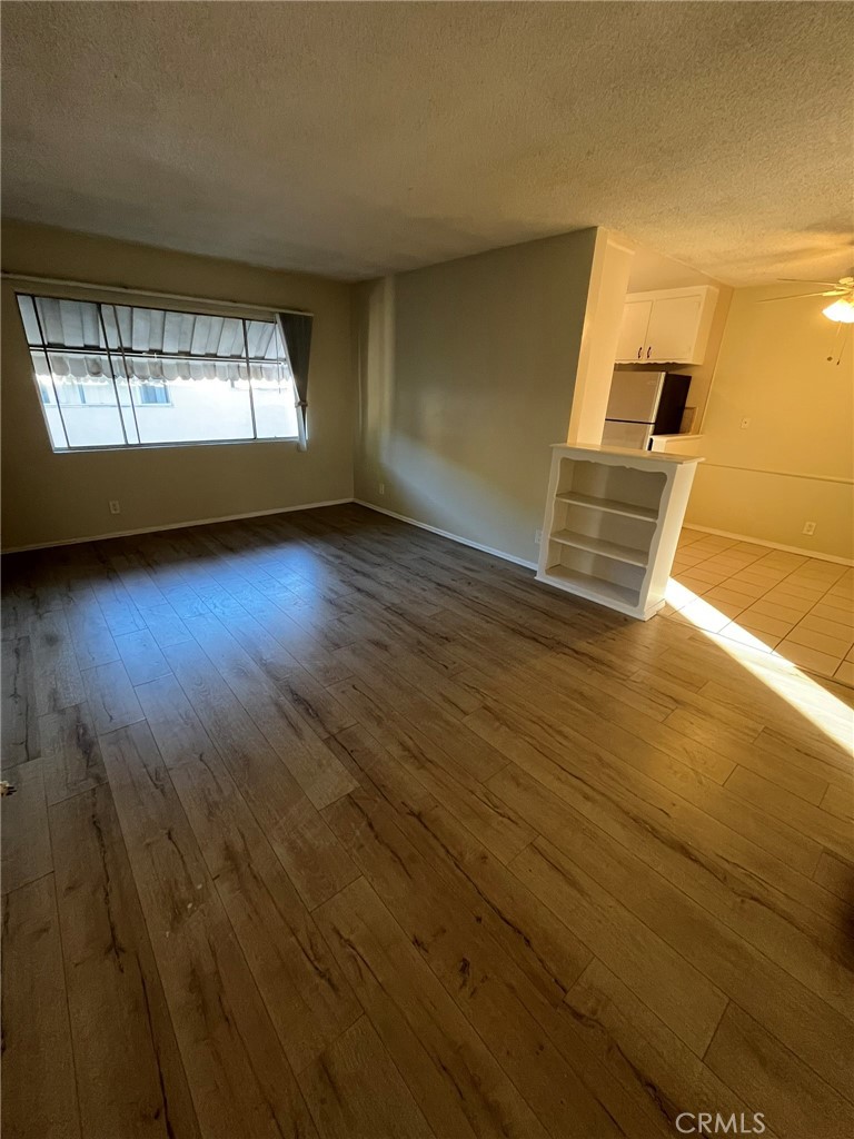 14632 Erwin Street, Unit 7 Van Nuys, CA 91411 - Photo 2 of 11 a view of an empty room with a window