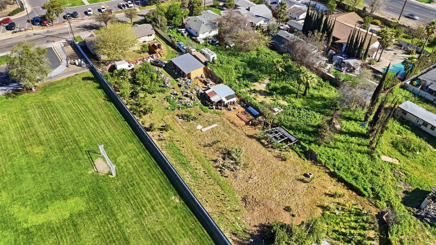 1409 Stonum Road Modesto, CA 95351 - Photo 37 of 40 an aerial view of residential houses with outdoor space