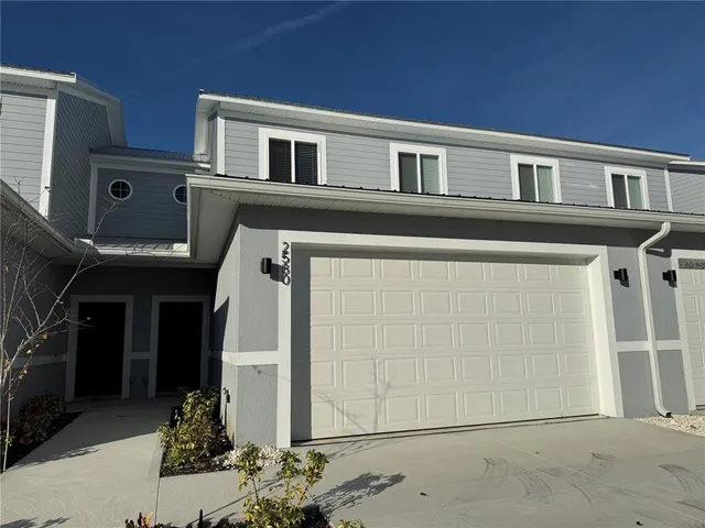 a view of a house with a wooden door