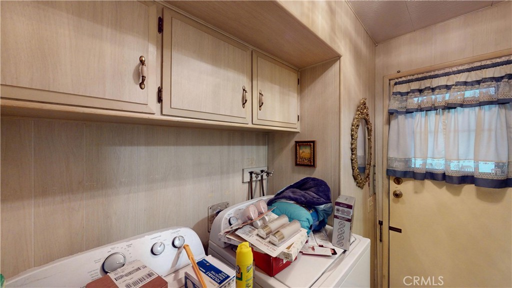 14851 Jeffrey Road, Unit 117 Irvine, CA 92618 - Photo 16 of 45 a view of walk in closet with clothes and shoes