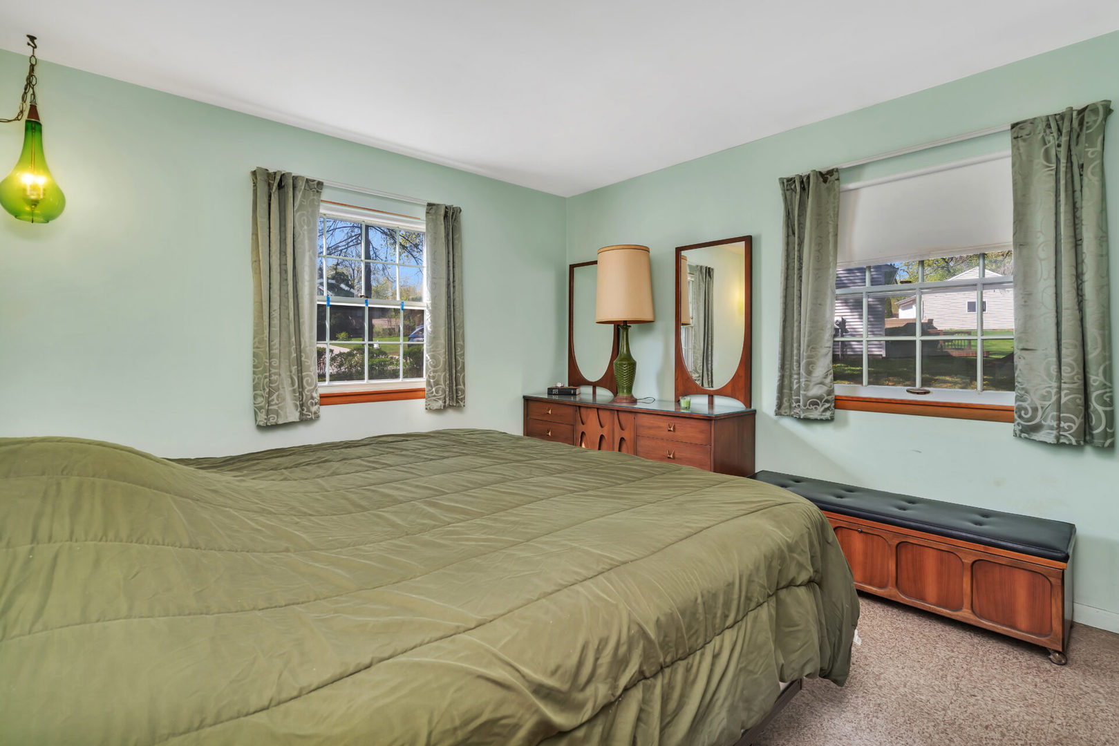 96 South Street Cary, IL 60013 - Photo 11 of 14 a bedroom with a bed window and mirror