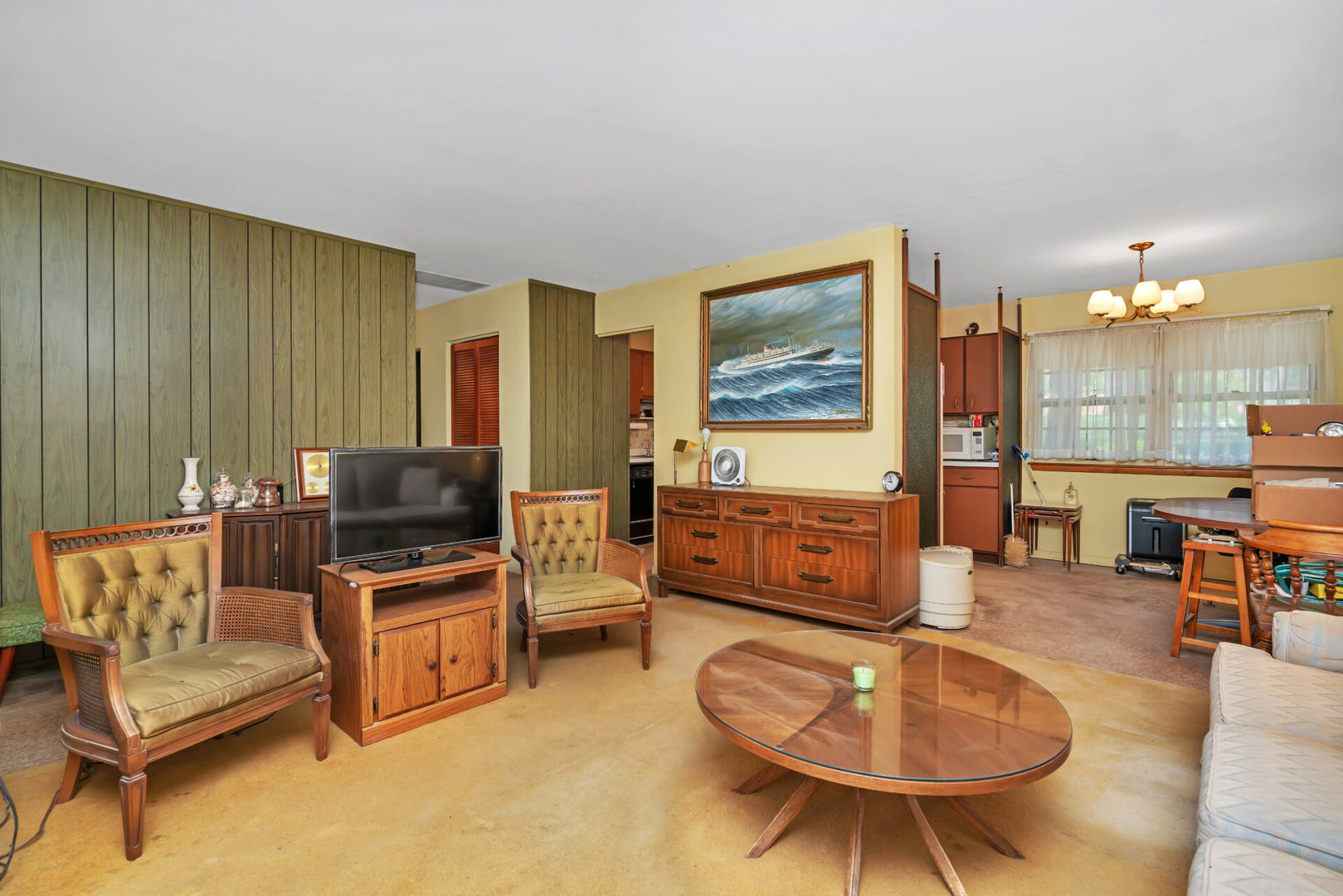 96 South Street Cary, IL 60013 - Photo 2 of 14 a living room with furniture and a flat screen tv