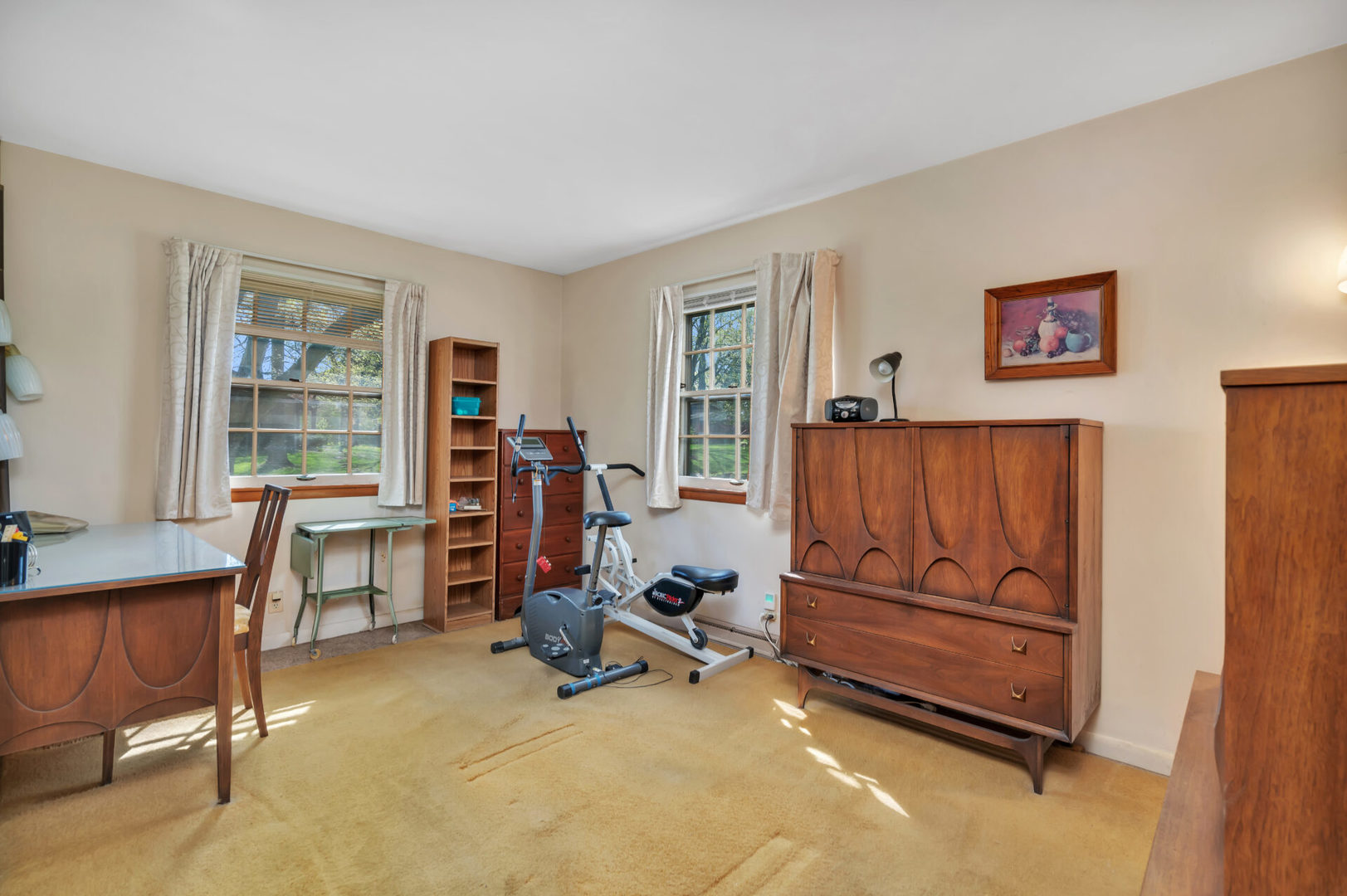 96 South Street Cary, IL 60013 - Photo 3 of 14 a view of a workspace with furniture and a window