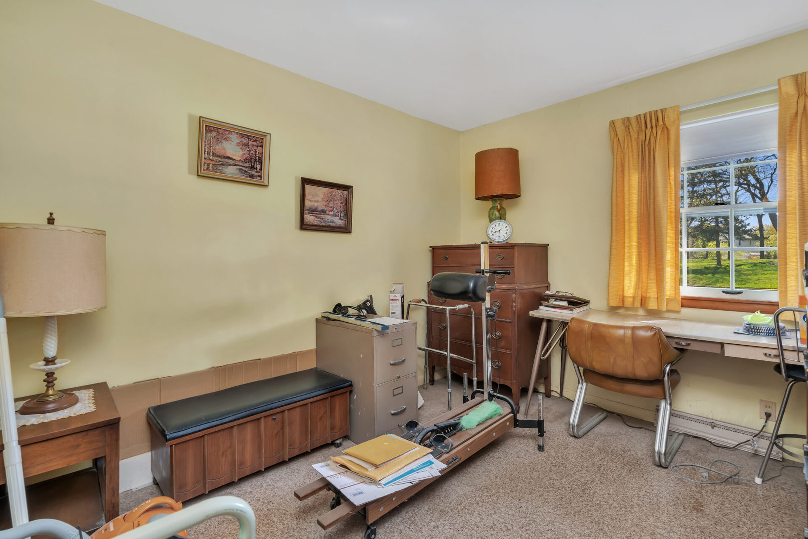 96 South Street Cary, IL 60013 - Photo 4 of 14 a view of a workspace with furniture and a window